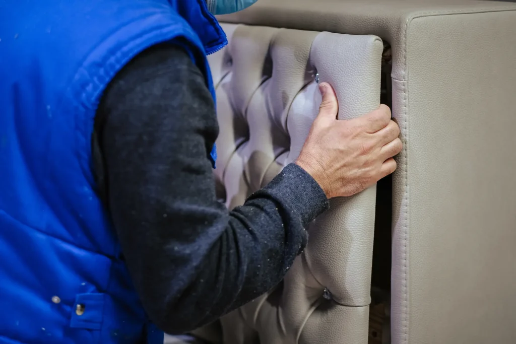 closeup shot of a worker assembling a couch 2025 02 12 00 02 15 utc